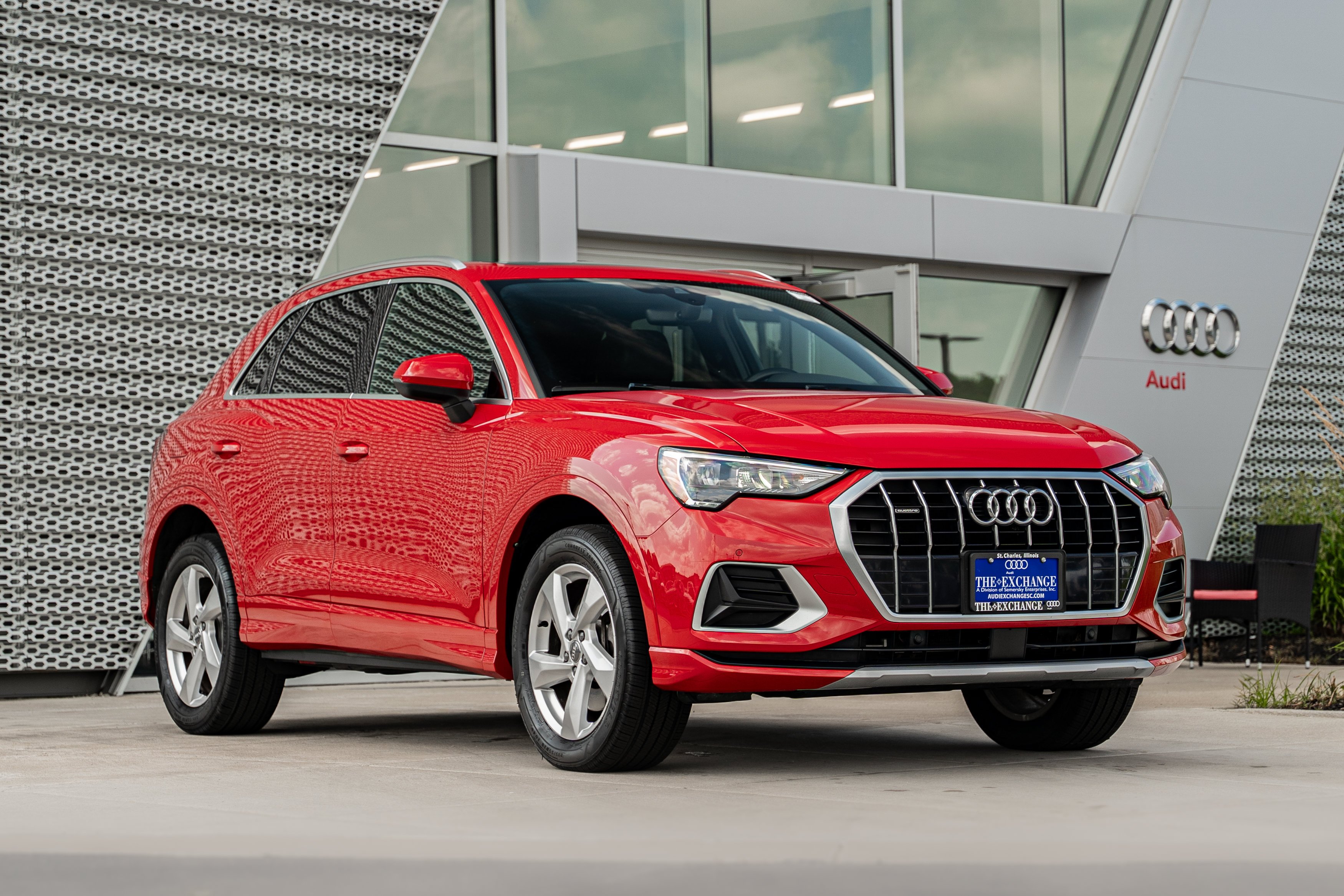Used 2019 Tango Red Metallic Audi Premium image 1
