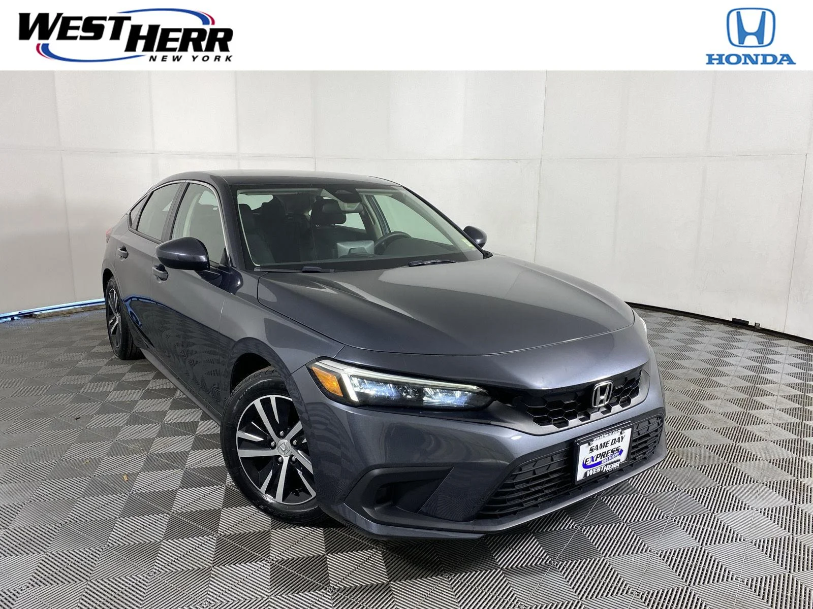 Used 2023 Meteorite Gray Metallic Honda LX image 1