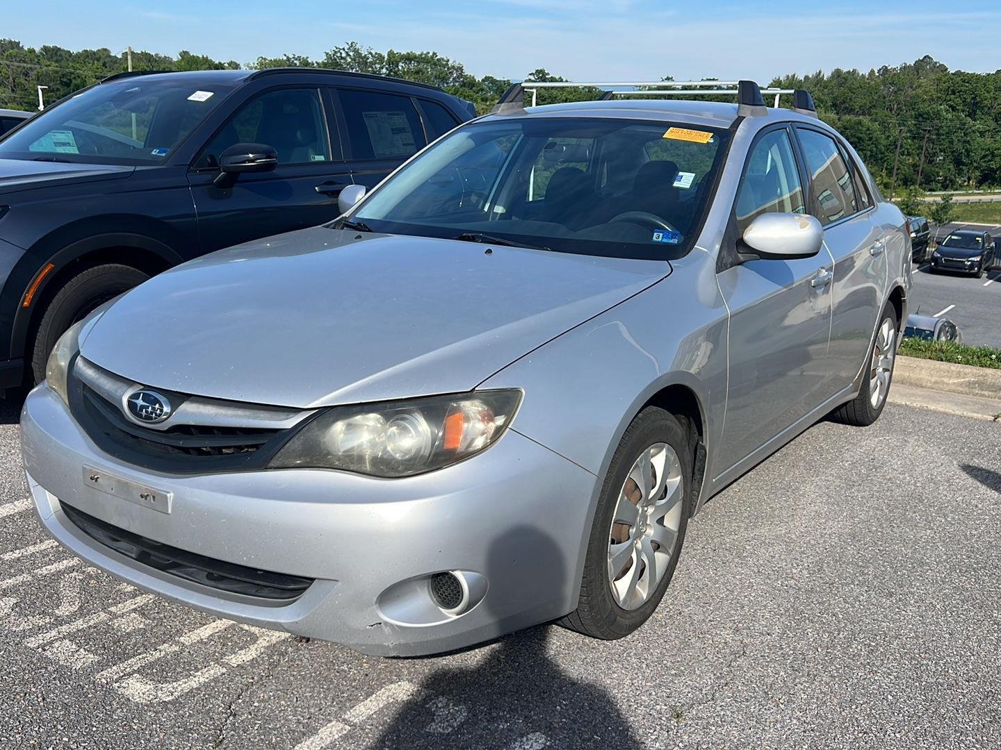 Used 2011 Spark Silver Metallic Subaru 2.5i image 1