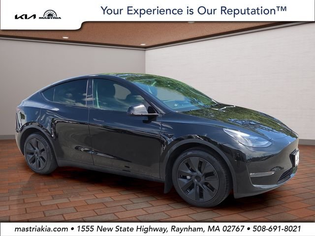 Used 2024 Solid Black Tesla Long Range image 1