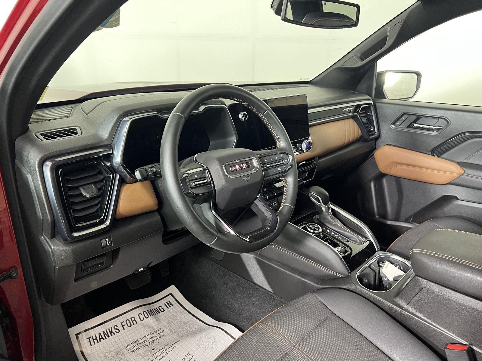 Used 2025 Volcanic Red Tintcoat GMC 4WD AT4 image 3