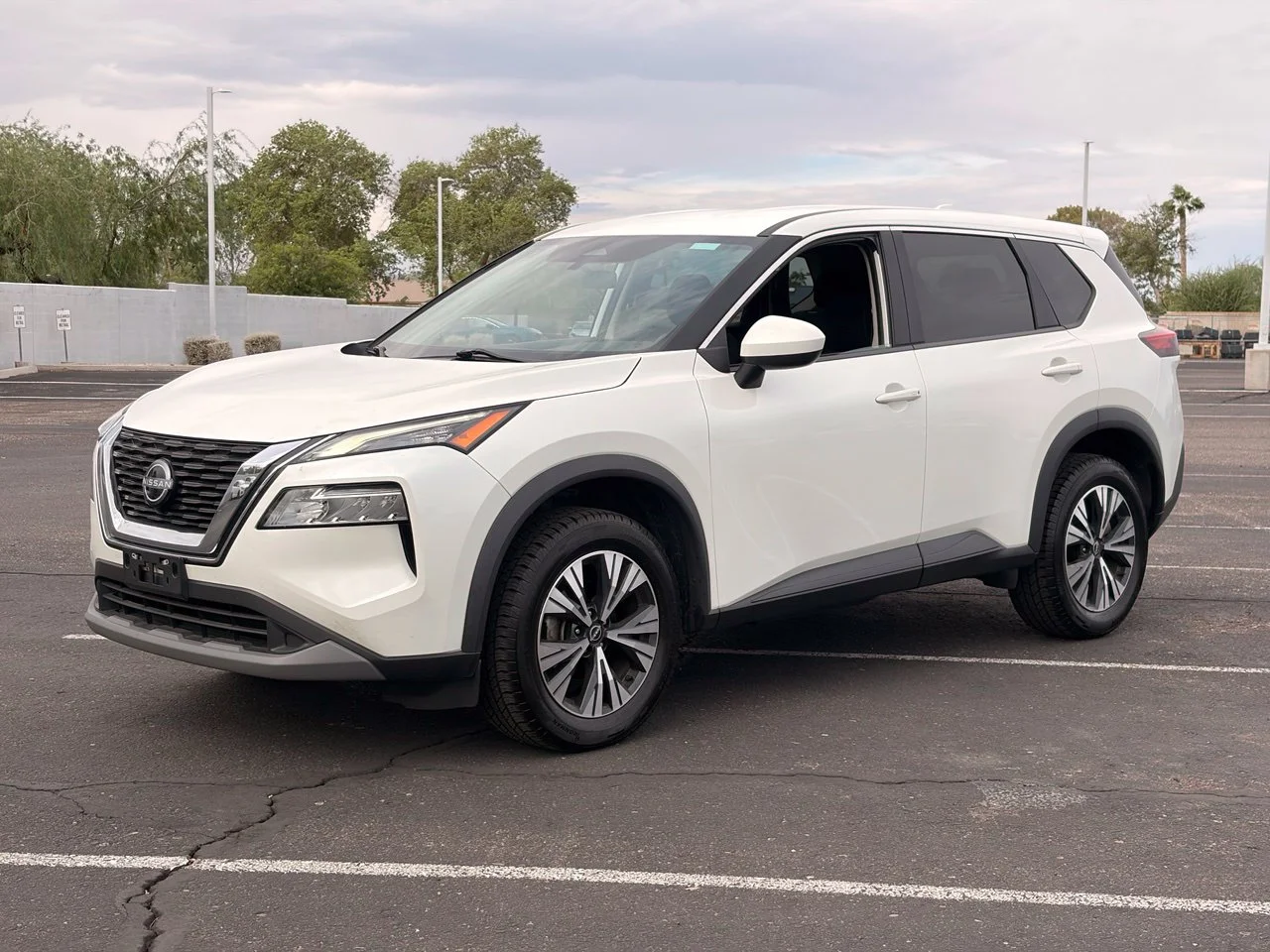 Used 2023 Pearl White Tricoat Nissan SV image 1