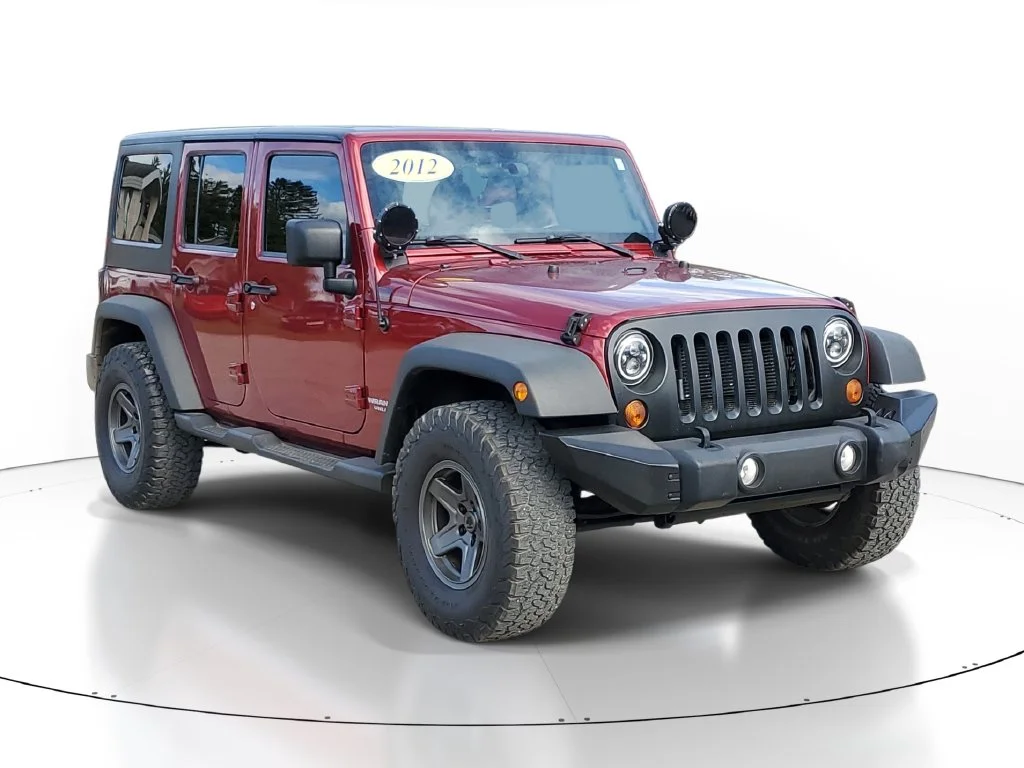 Used 2012 Jeep Wrangler Unlimited Sport with VIN 1C4BJWDGXCL164150 for sale in Clare, MI
