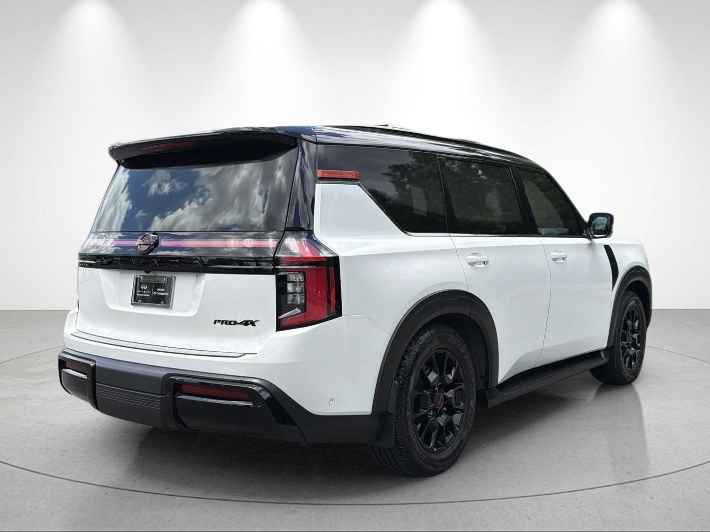 Used 2025 Aspen White Tricoat/Super Black Nissan PRO-4X image 5
