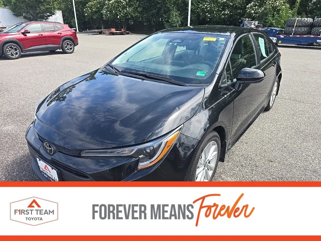 Used 2024 Black Toyota LE image 1