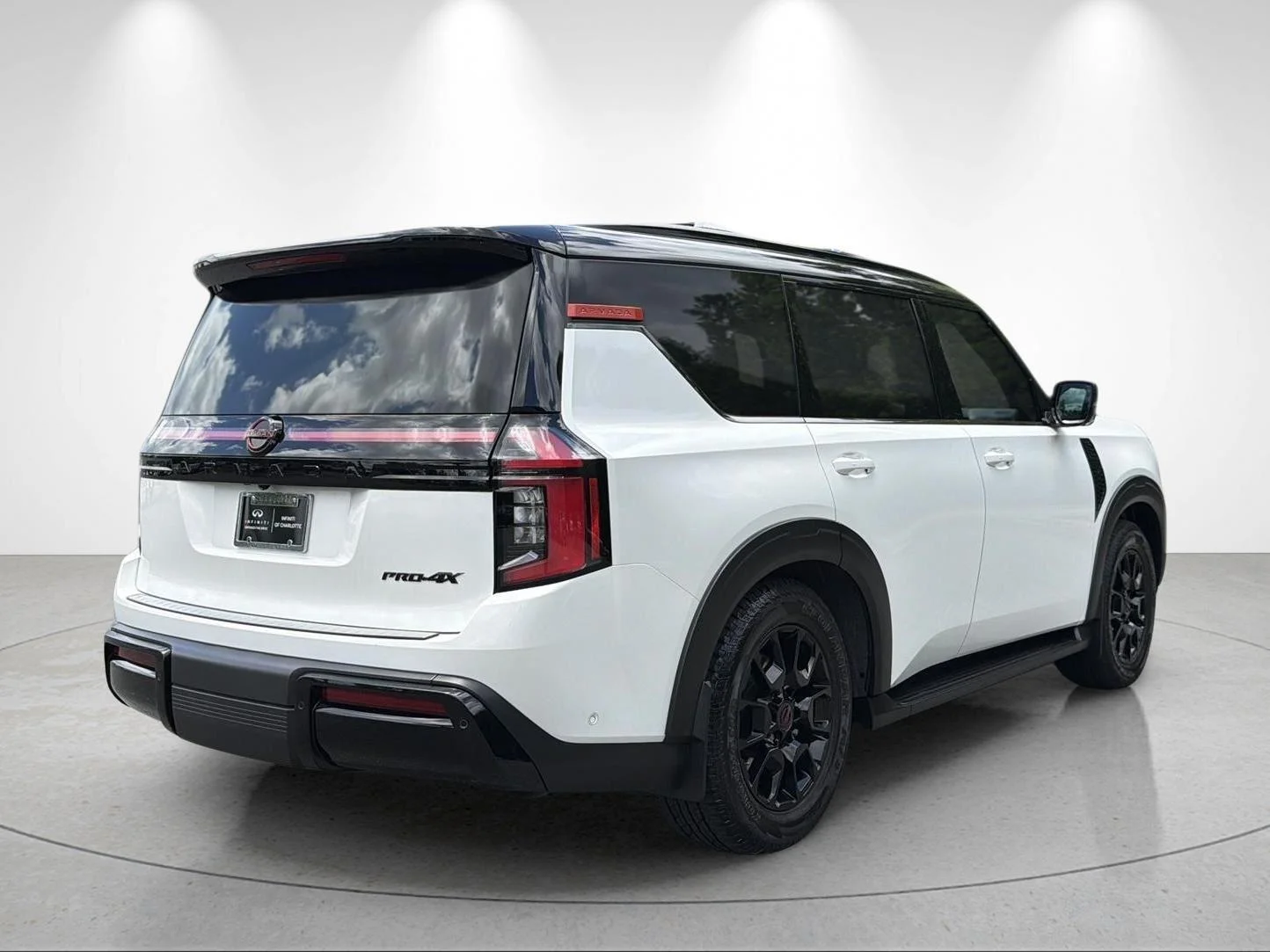 Used 2025 Aspen White Tricoat/Super Black Nissan PRO-4X image 5
