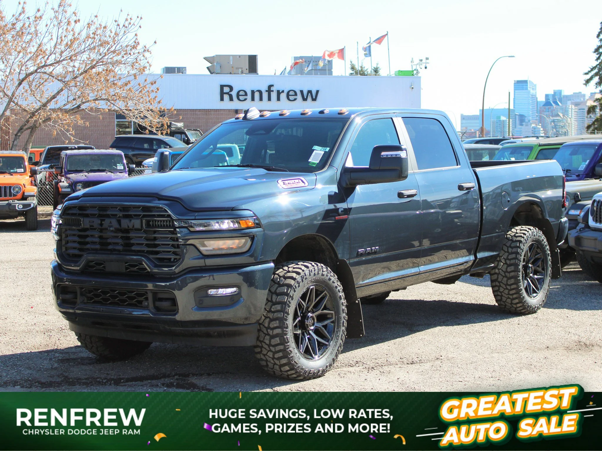 New 2026 Blue RAM Big Horn* Crew Cab 4x4, 35 Inch Toyos, Fuel Wheels, Trigger Industries Mudflaps image 1