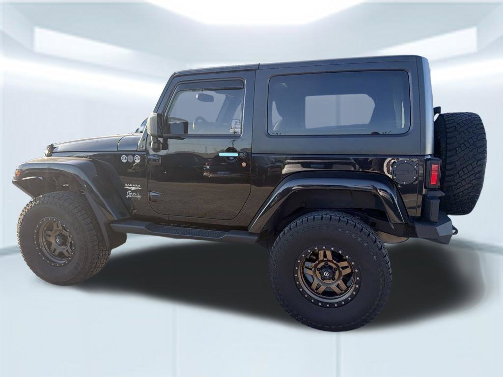 Used 2015 Black Clearcoat Jeep Sahara image 18