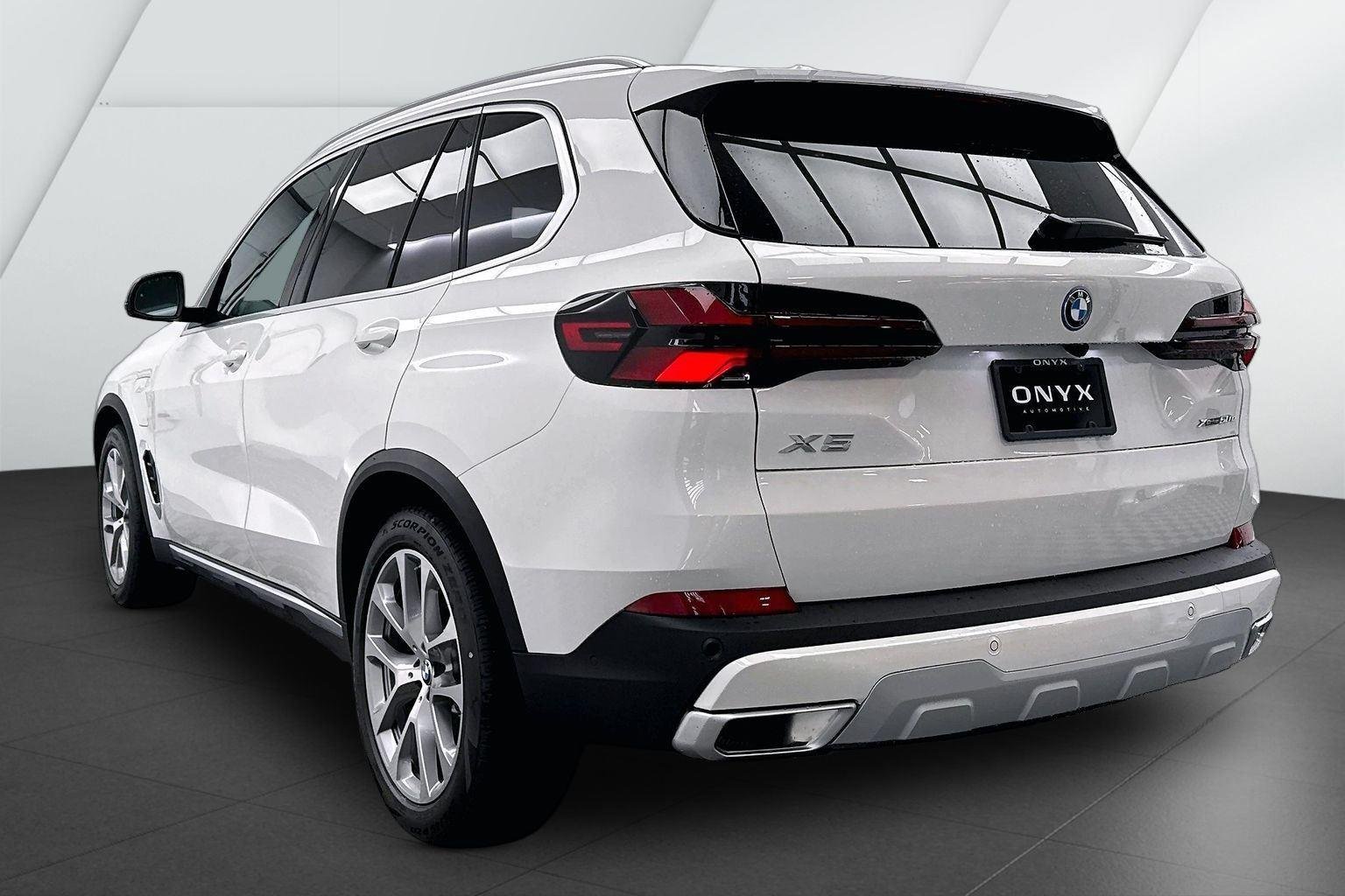 New 2026 Alpine White BMW xDrive50e image 5