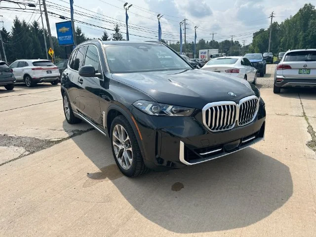 Used 2024 Black BMW xDrive50e image 12