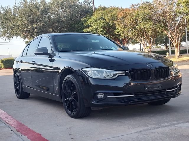Used 2018 Black BMW 330i image 1