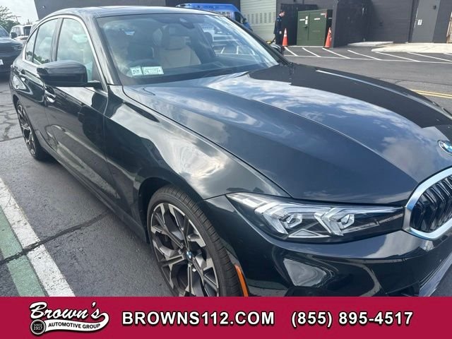 Used 2025 Black BMW 330i xDrive image 1