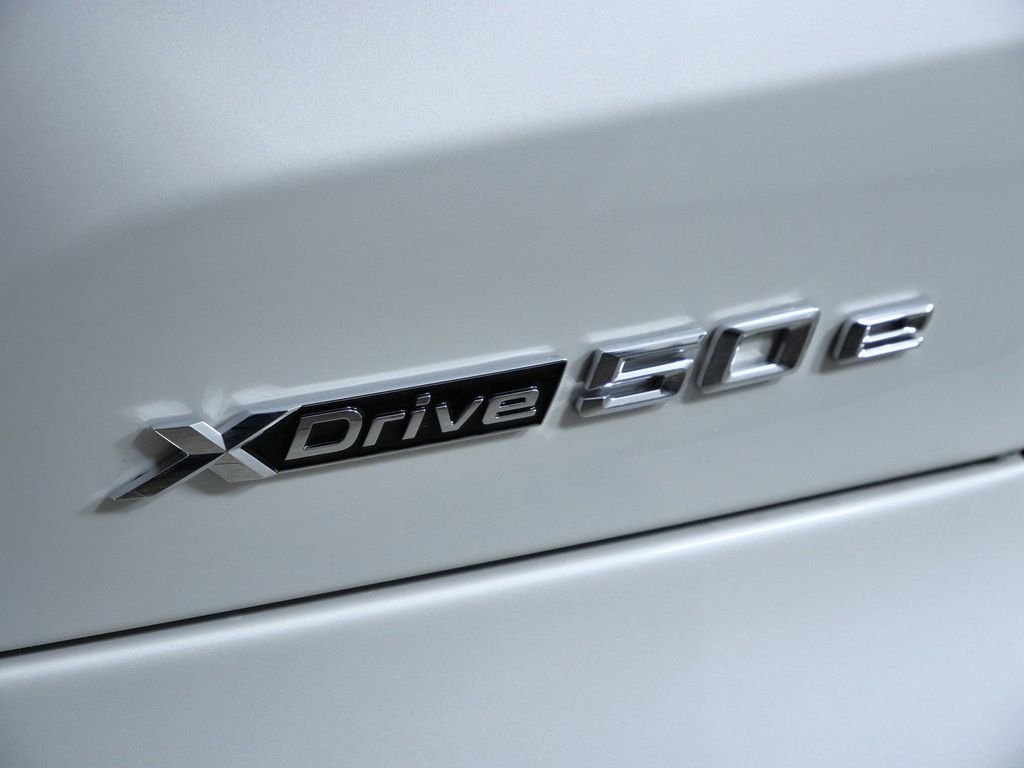 Used 2026 Mineral White Metallic BMW xDrive50e image 13