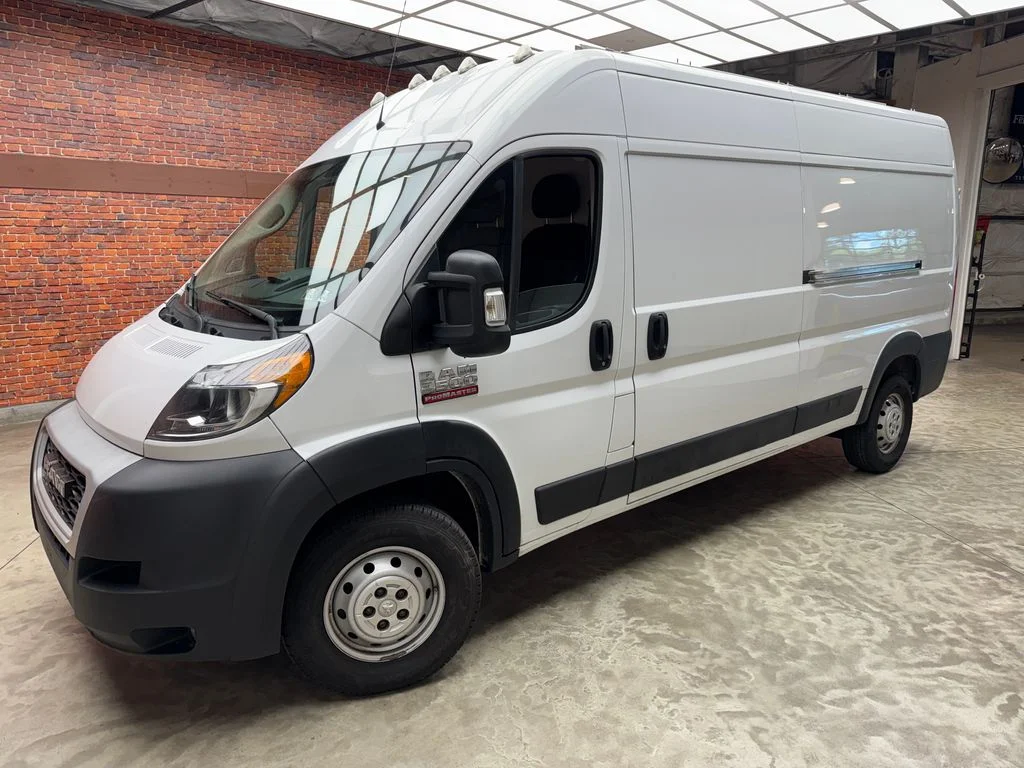 Used 2021 Bright White Clearcoat Ram High Roof image 1