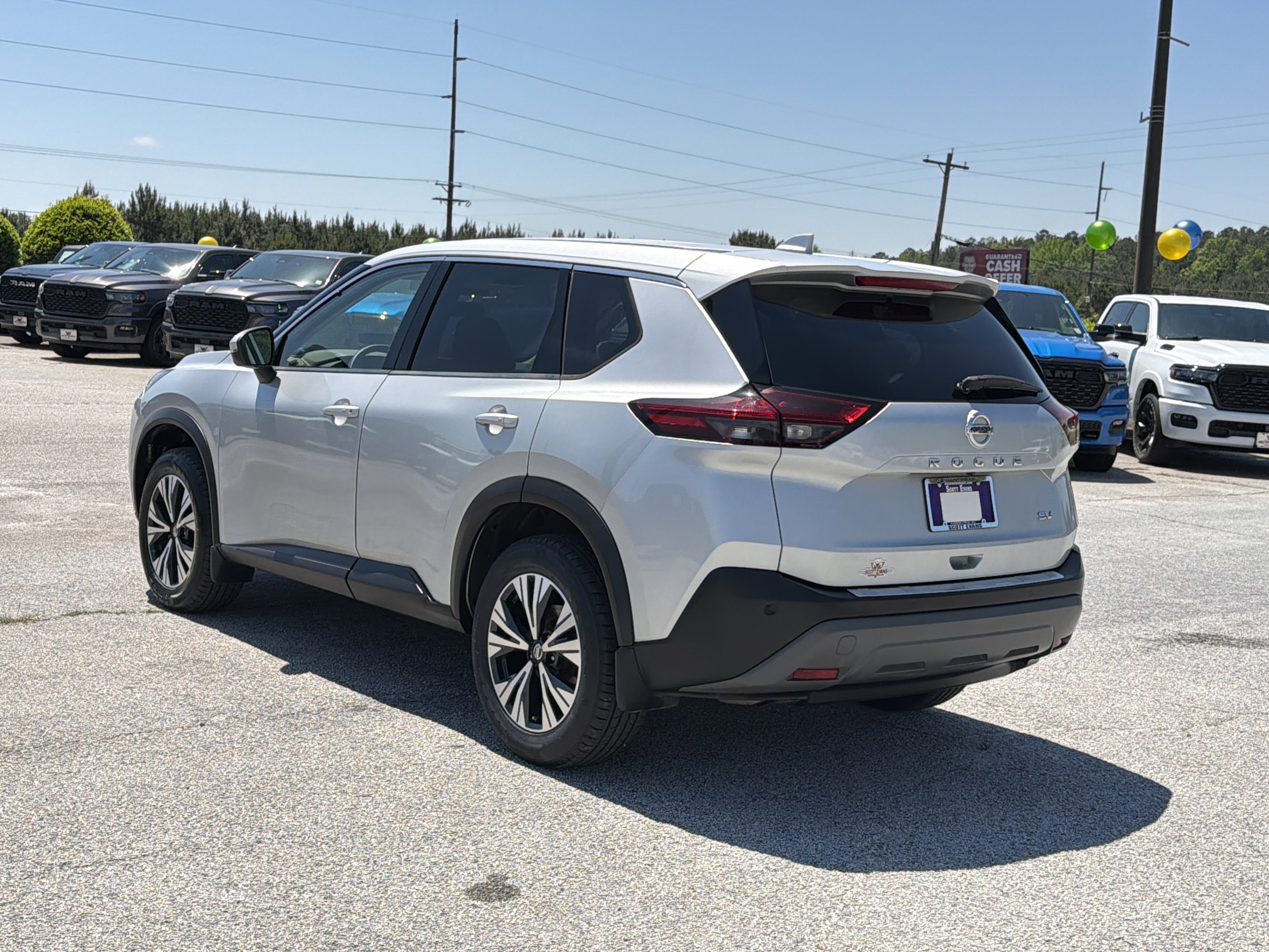 Used 2021 Brilliant Silver Metallic Nissan SV image 9
