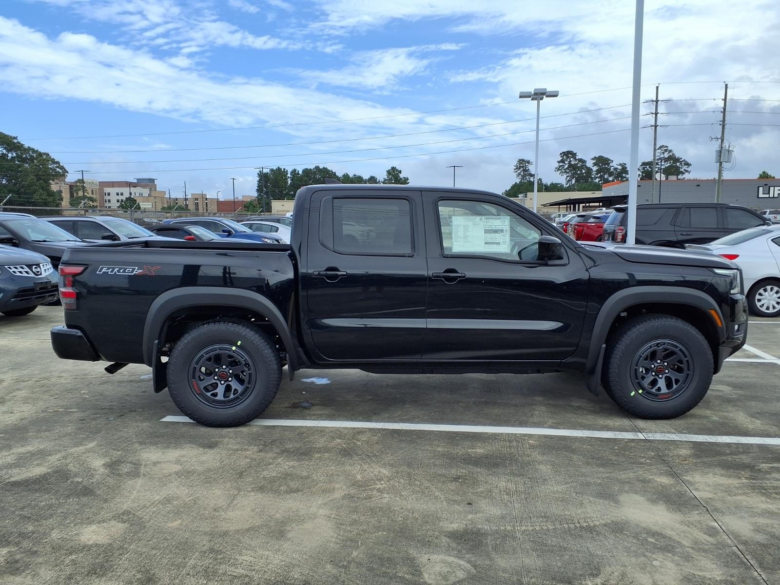 New 2026 Super Black Nissan Crew Cab PRO-X® image 8