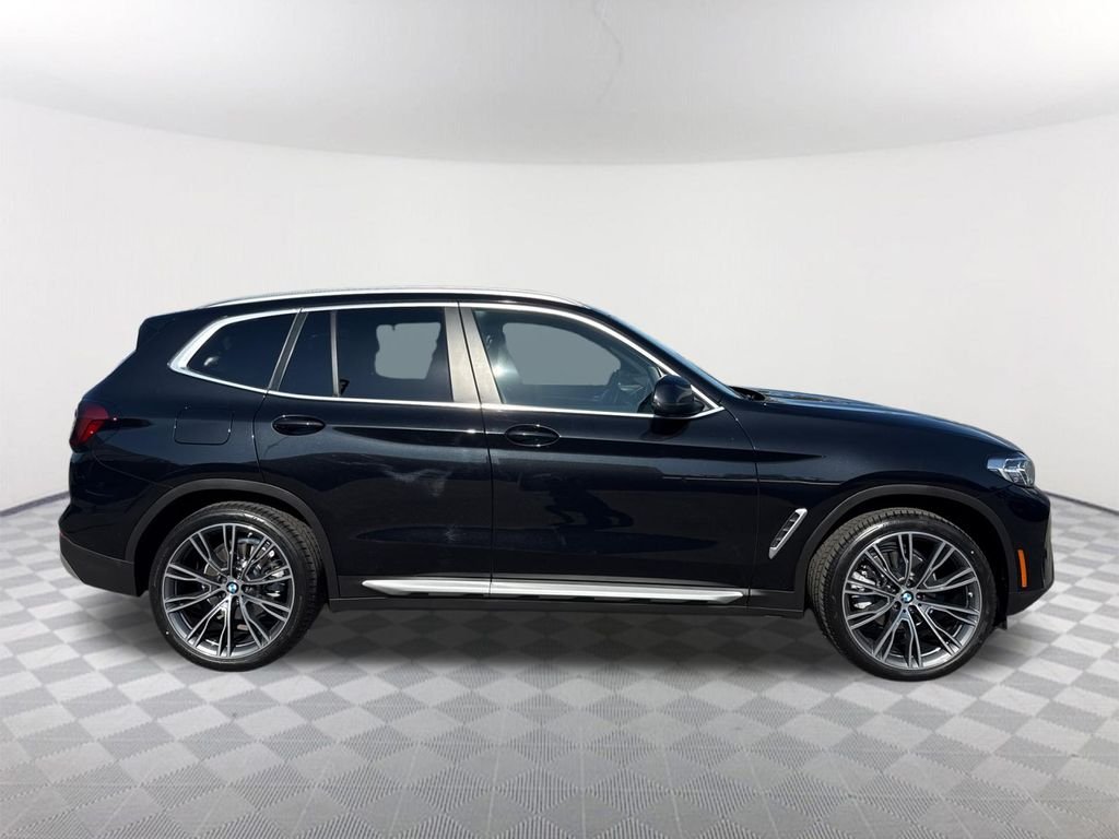 Used 2023 Black Sapphire Metallic BMW sDrive30i image 3