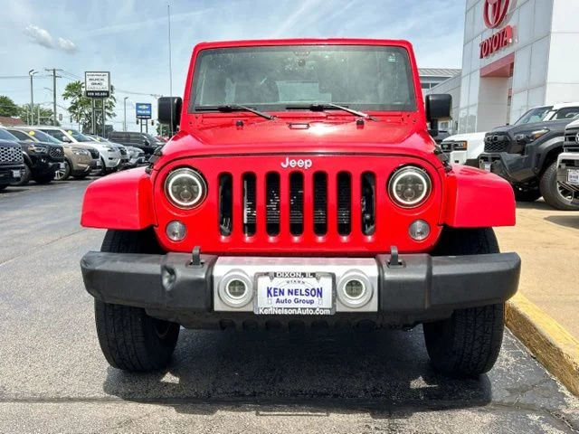 Used 2015 Jeep Wrangler Unlimited Sahara with VIN 1C4BJWEG7FL672823 for sale in Dixon, IL