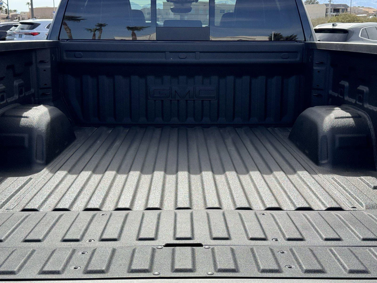 New 2026 TITANIUM RUSH METALLIC GMC AT4X image 13
