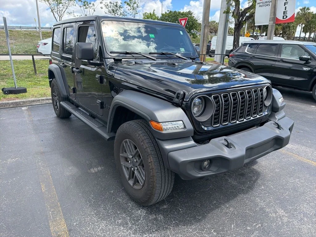 Used 2024 Black Clearcoat Jeep Sport S image 1