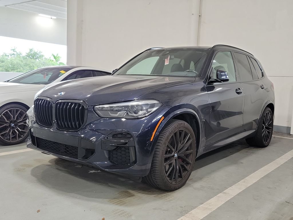 Certified Used 2023 Carbon Black Metallic BMW sDrive40i image 1