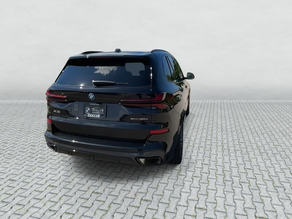 New 2026 Black Sapphire Metallic BMW xDrive50e image 8