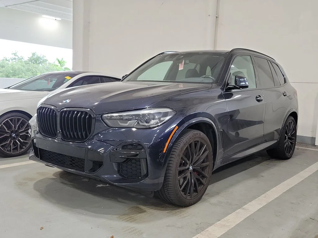Used 2023 Carbon Black Metallic BMW sDrive40i image 1