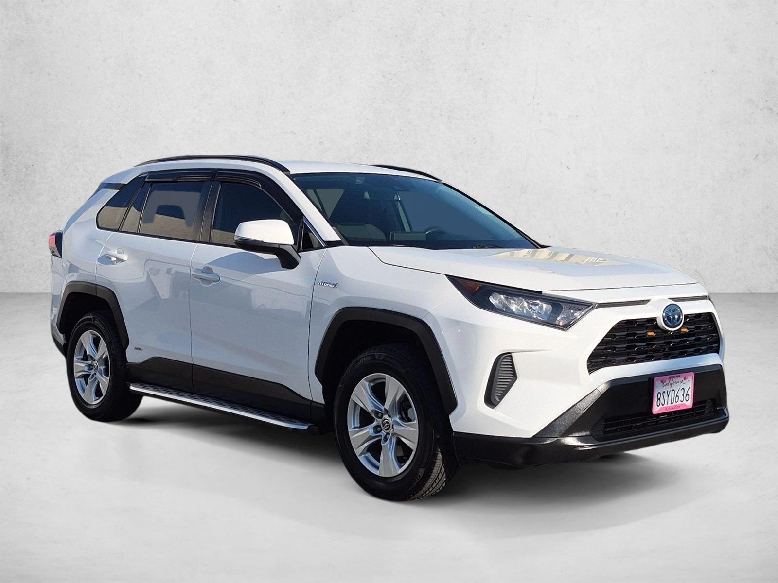 Used 2021 Super White Toyota Hybrid LE image 3