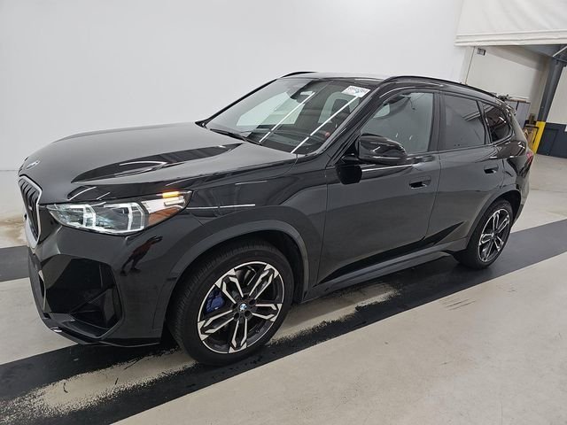 Used 2025 Black Sapphire Metallic BMW M35i image 4