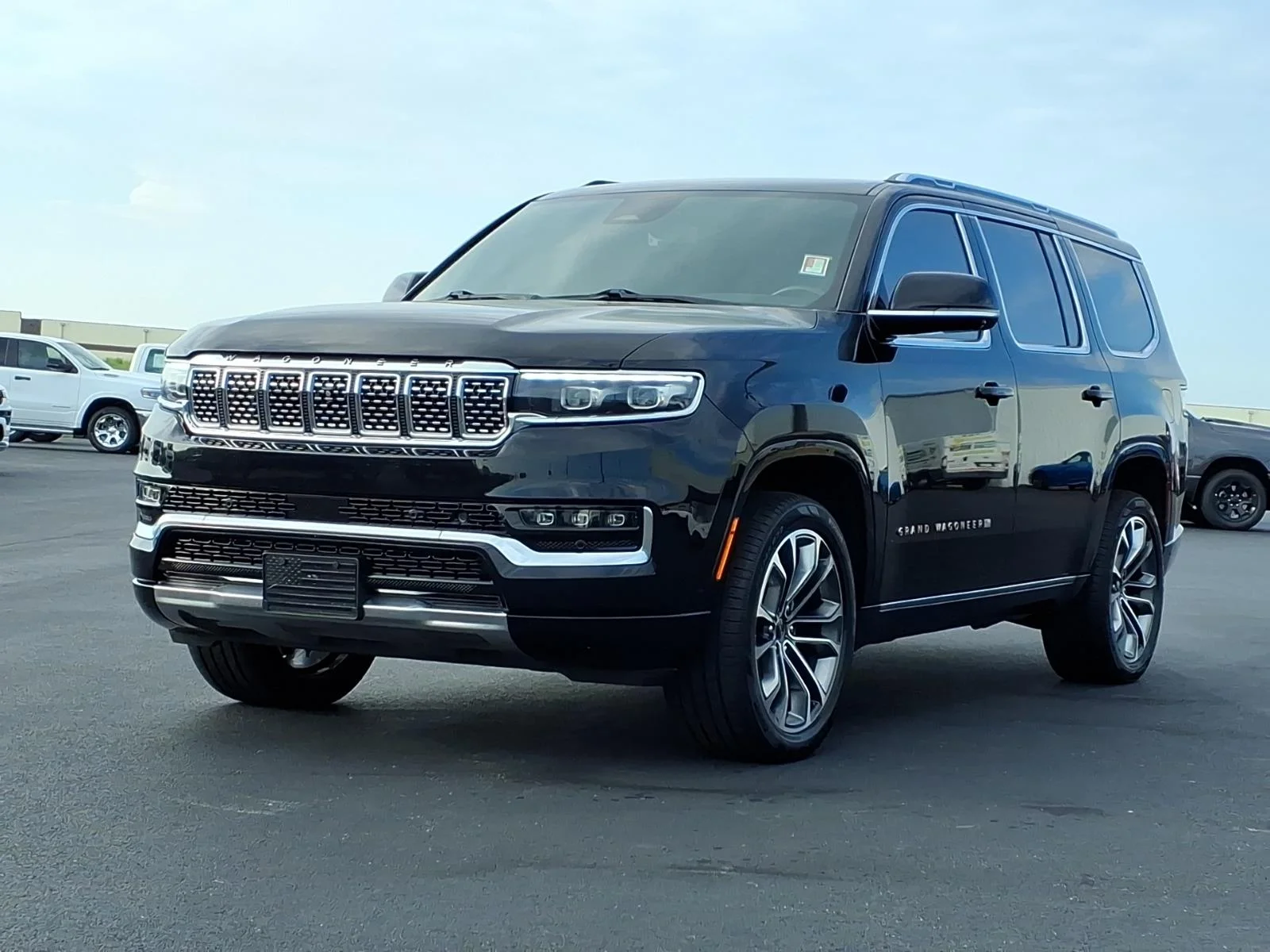 Used 2023 Diamond Black Crystal Pearl Coat Jeep Series III image 18