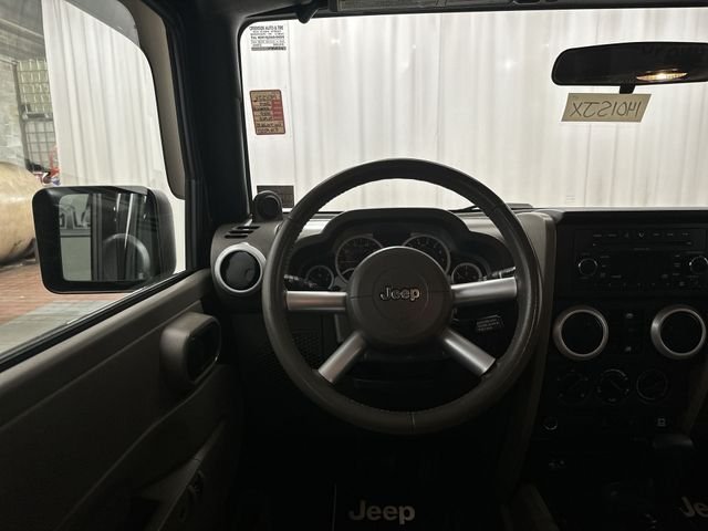 Used 2009 Black Jeep Unlimited Sahara image 13