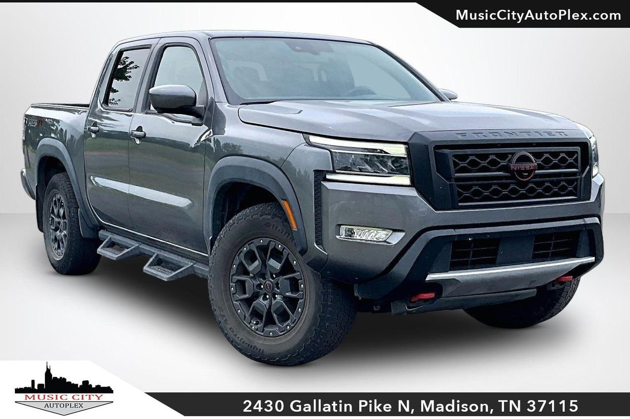 Used 2023 Gun Metallic Nissan Crew Cab PRO-4X 4x4 image 1
