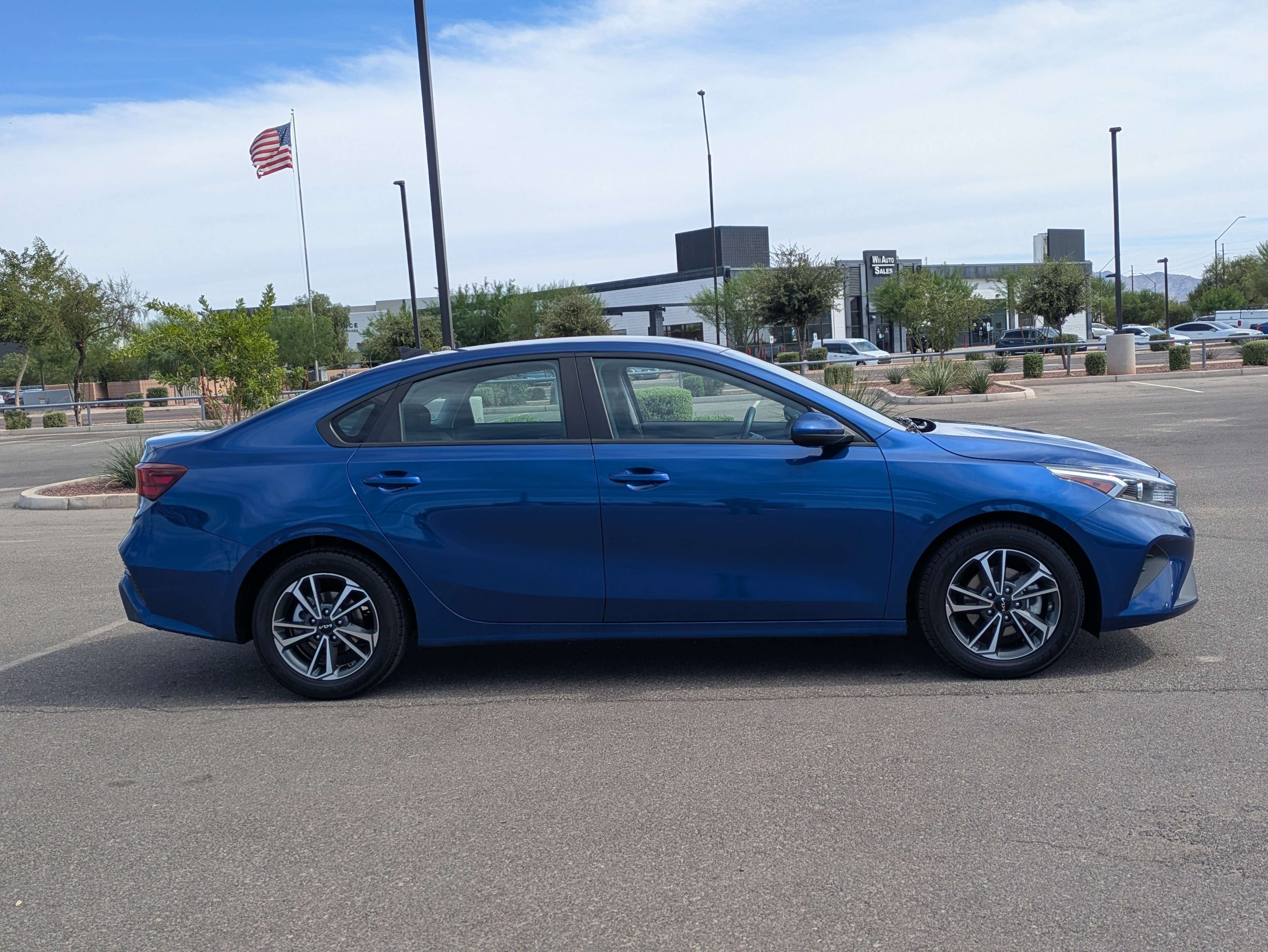 Used 2024 Deep Sea Blue Kia LXS image 6