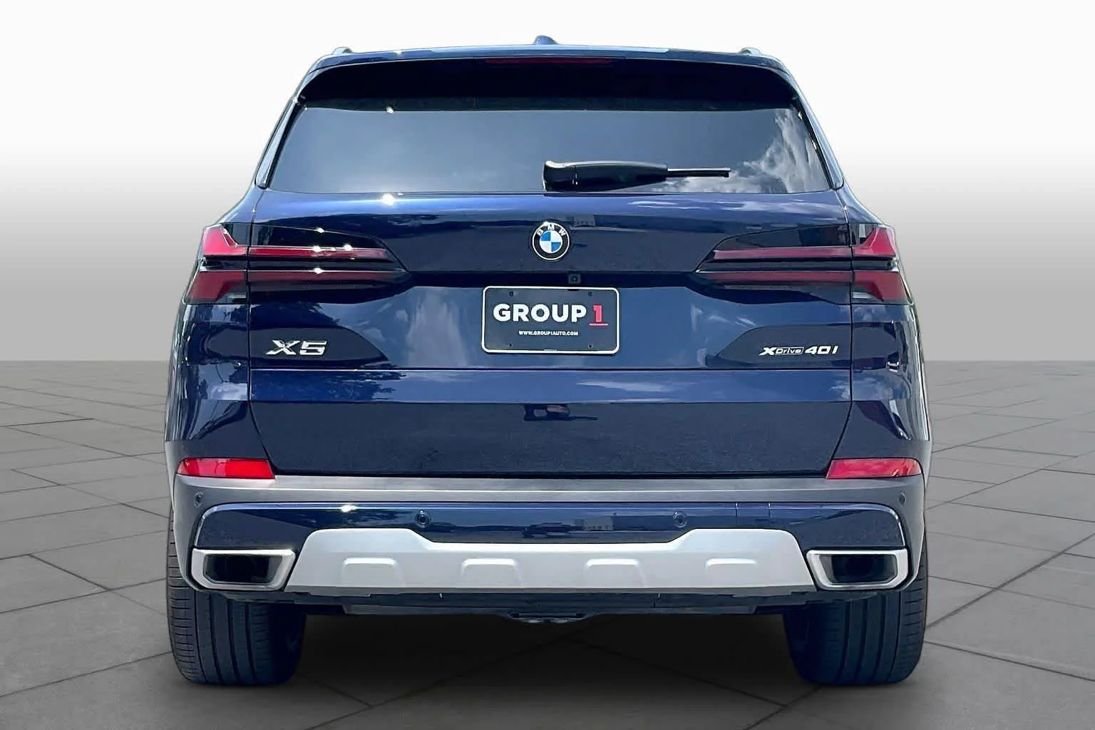 Used 2026 Tanzanite Blue II Metallic BMW xDrive40i image 4