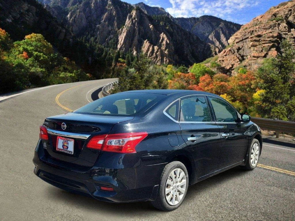 Used 2019 Super Black Nissan S image 3