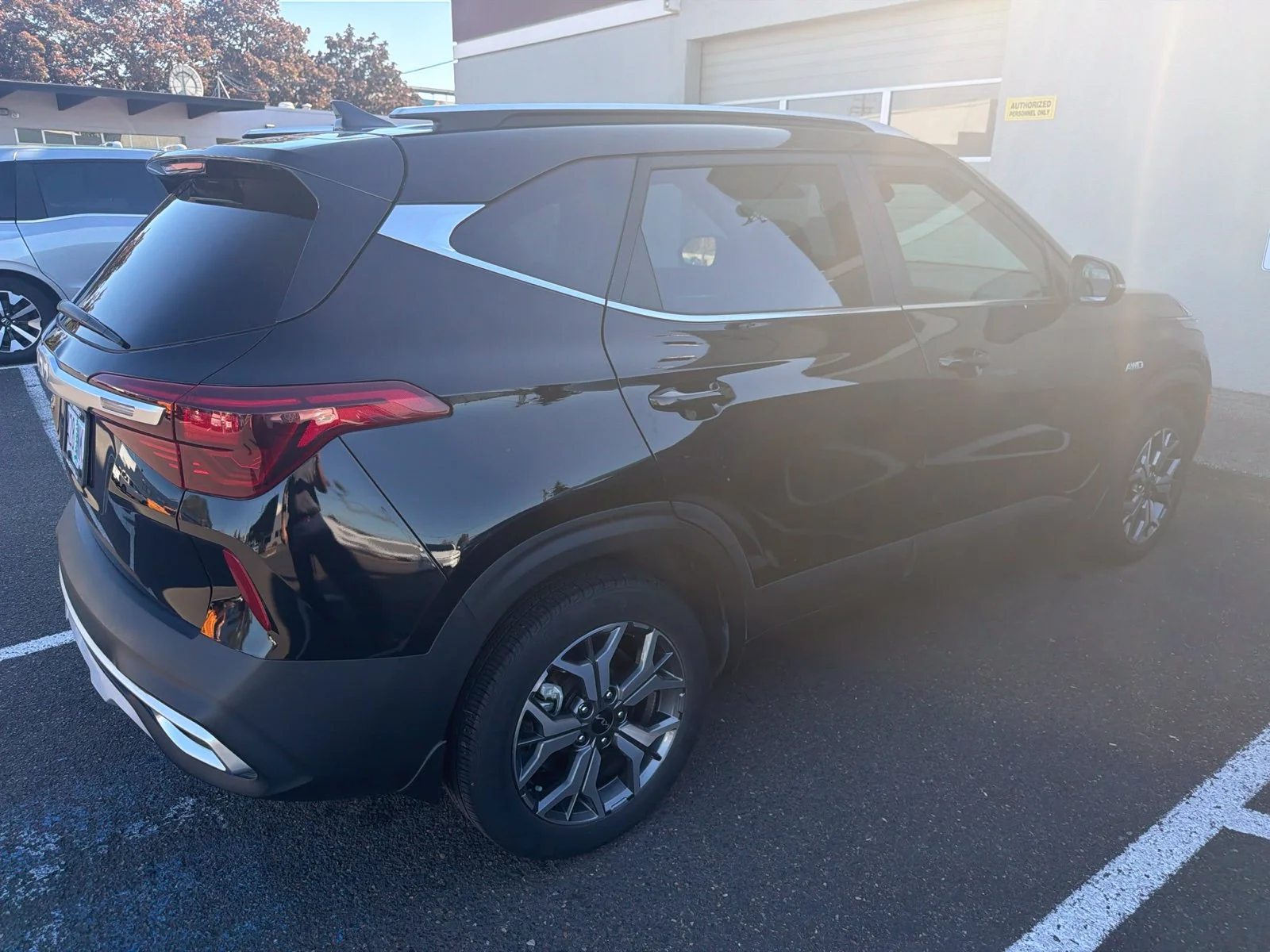 Used 2022 Cherry Black Kia EX image 4