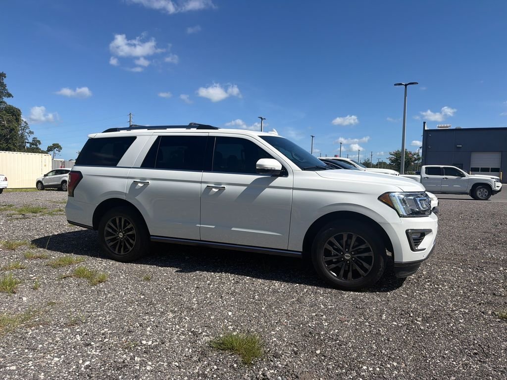 Used 2021 White Metallic Ford Limited image 4
