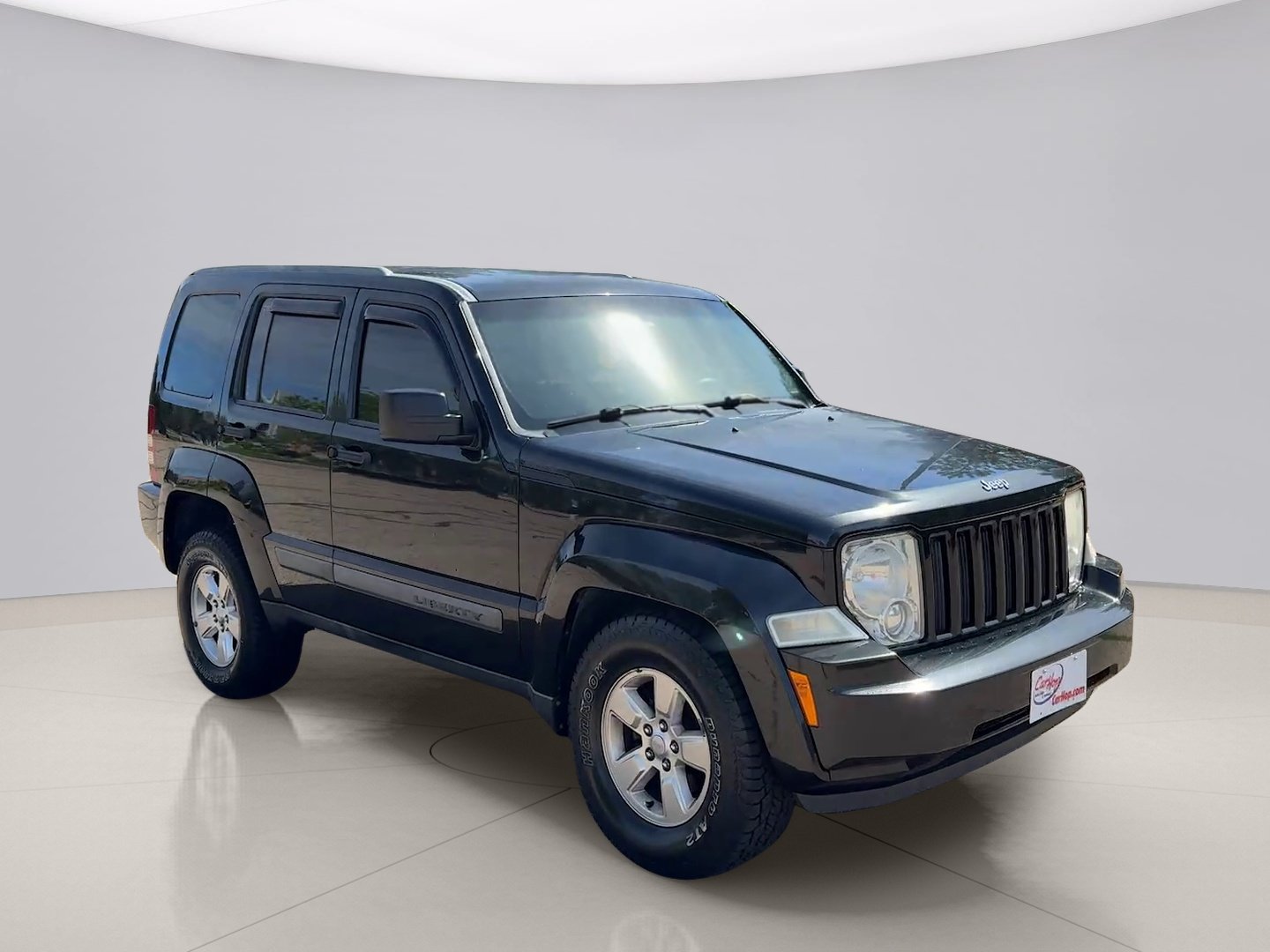 Used 2011 Black Jeep SPORT image 7