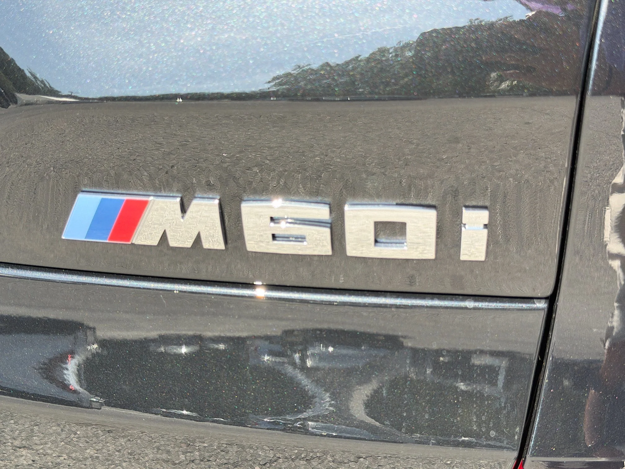 New 2026 Black Sapphire Metallic BMW M60i image 10