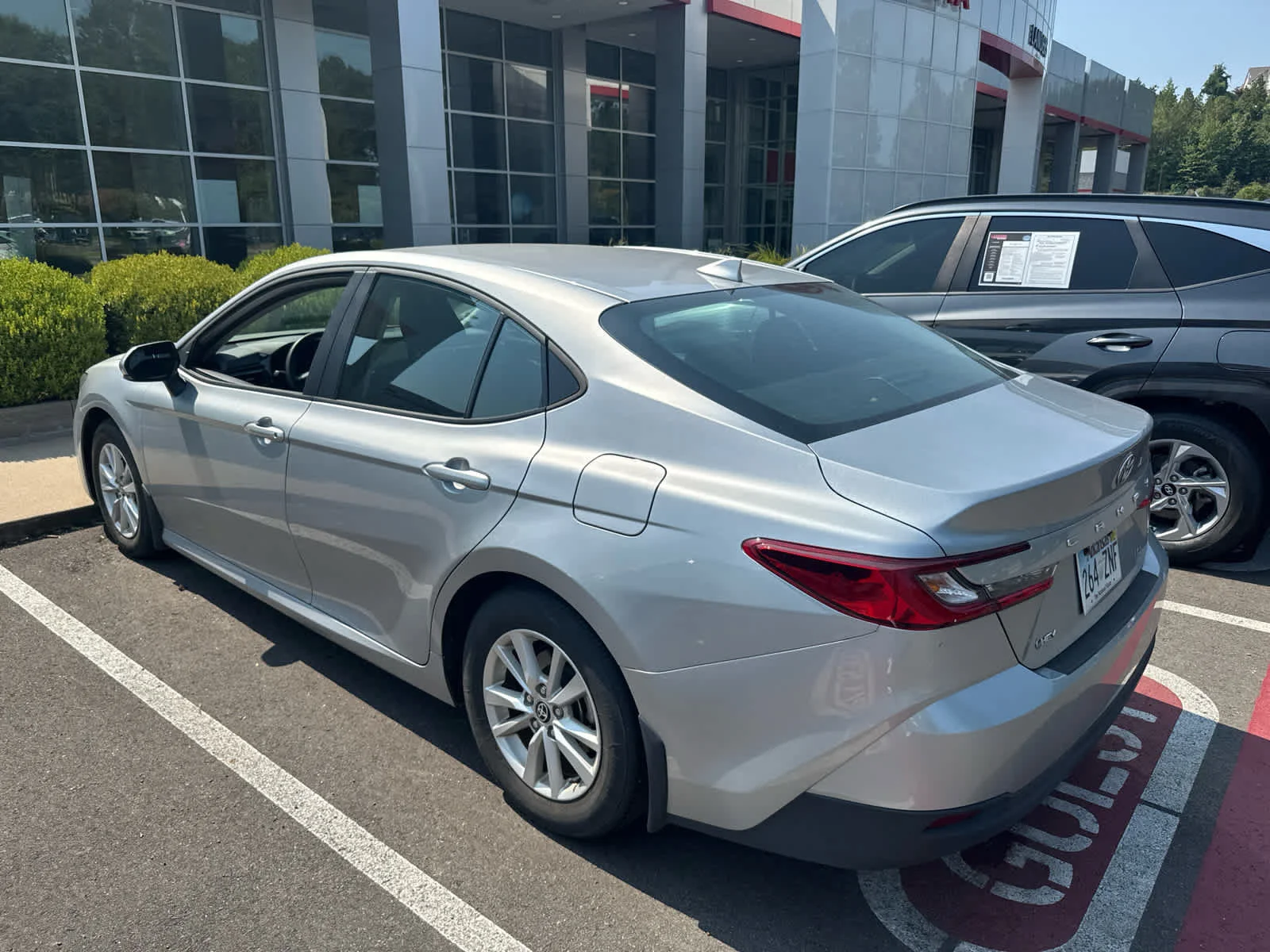 Used 2025 Celestial Silver Metallic Toyota LE image 3