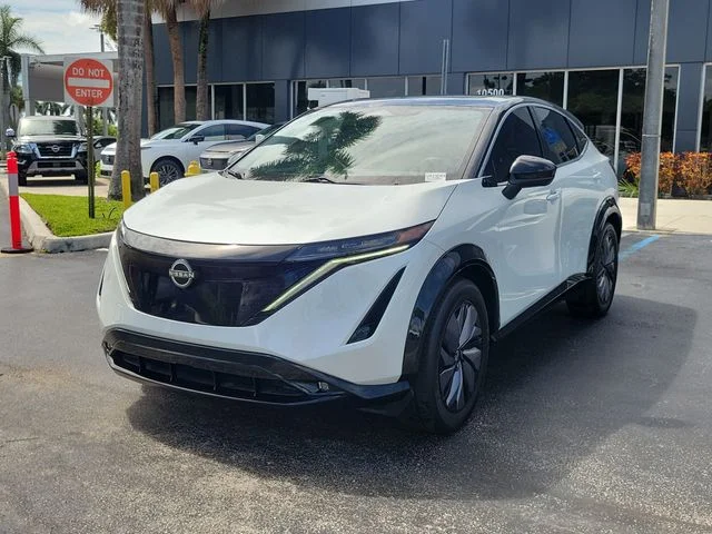 Certified Used 2024 White Nissan EVOLVE+ image 3