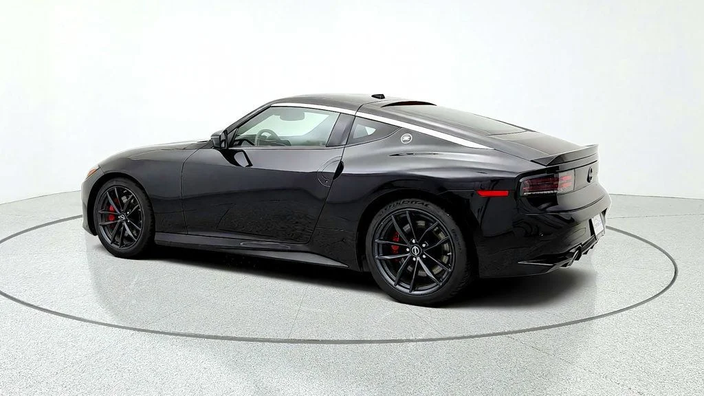 Used 2024 Black Diamond Pearl Nissan Performance Automatic image 7