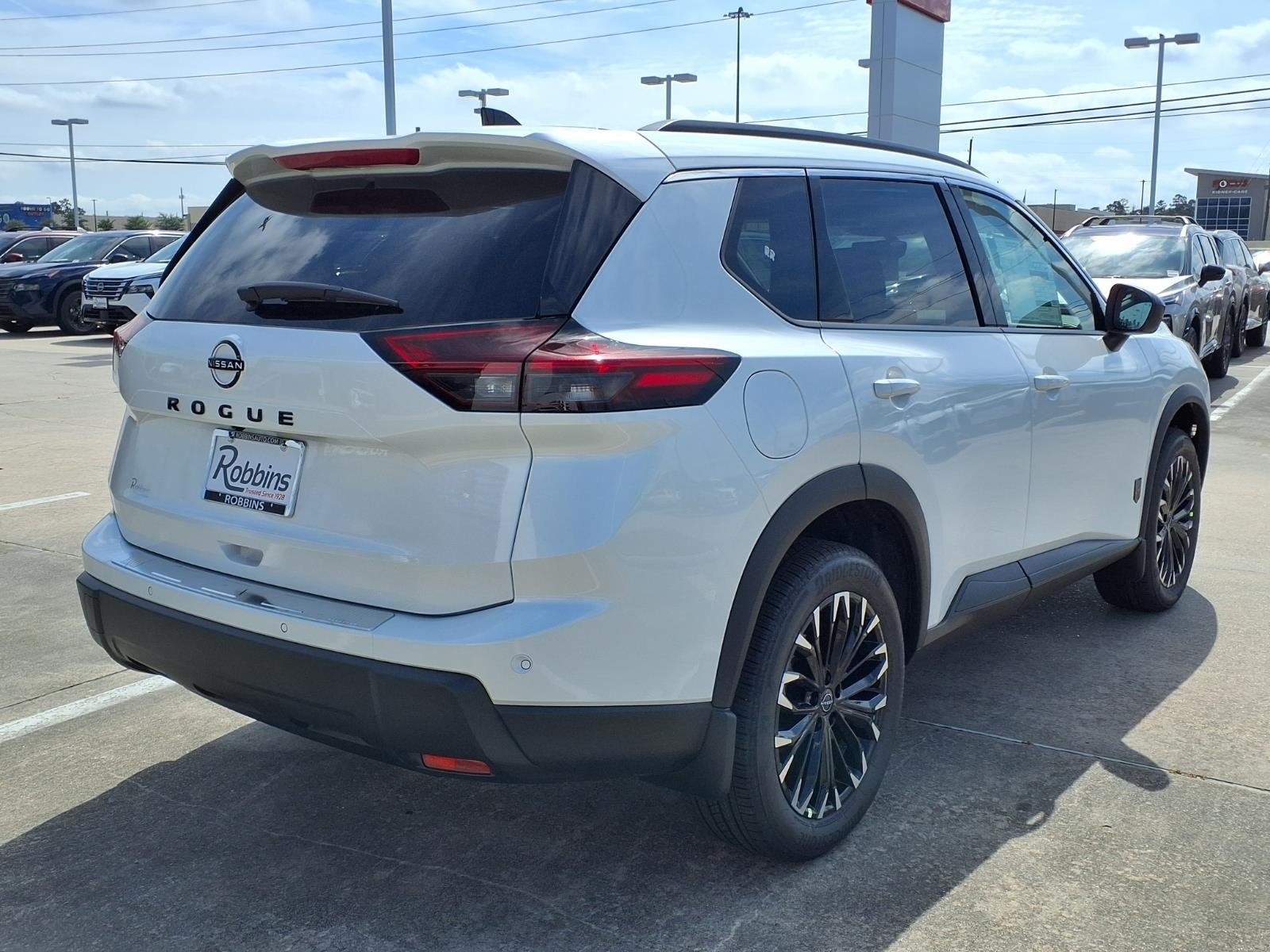 2026 Nissan Rogue Dark Armor™ White at Robbins Nissan