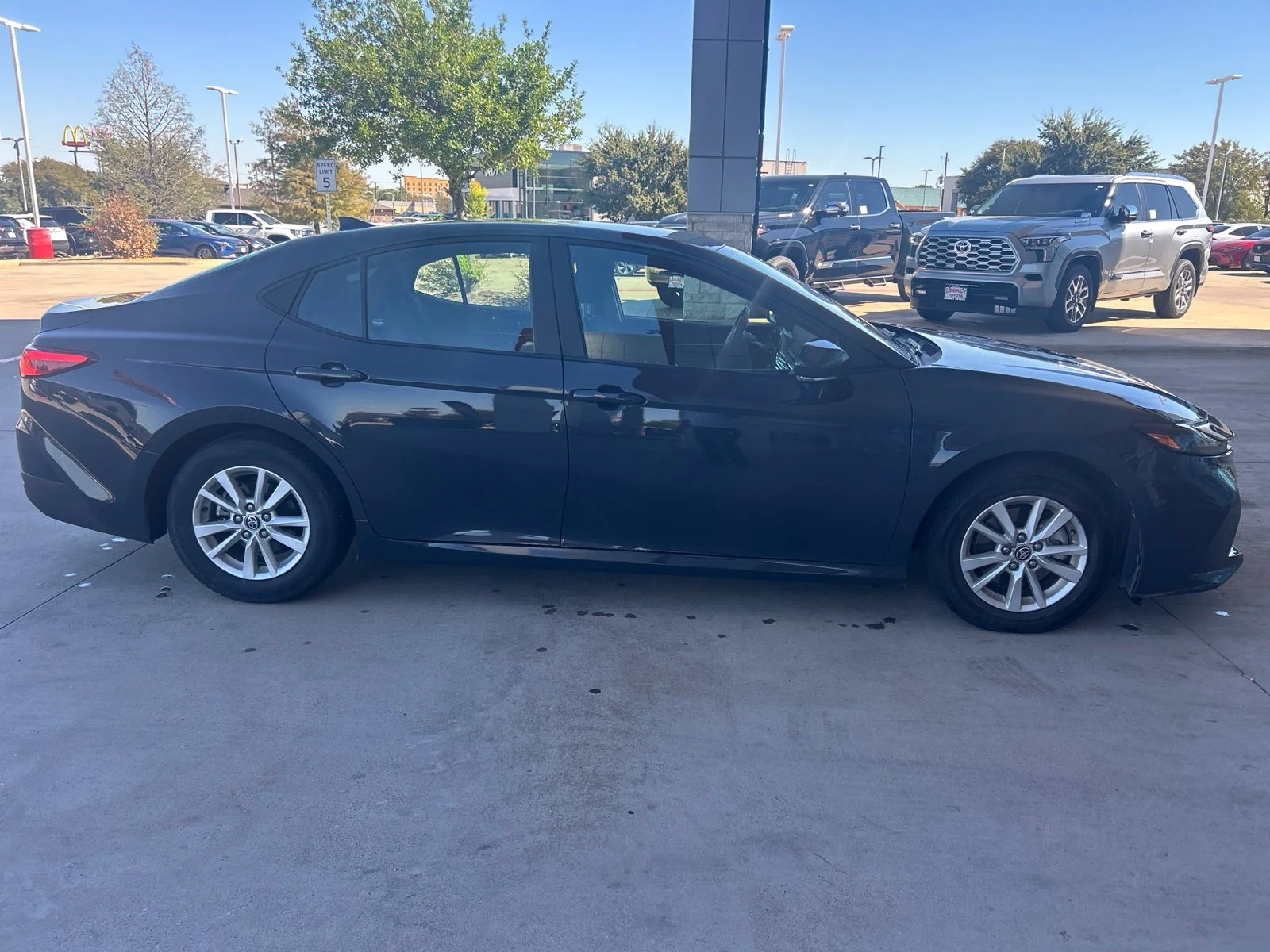 Used 2025 Black Toyota LE image 5