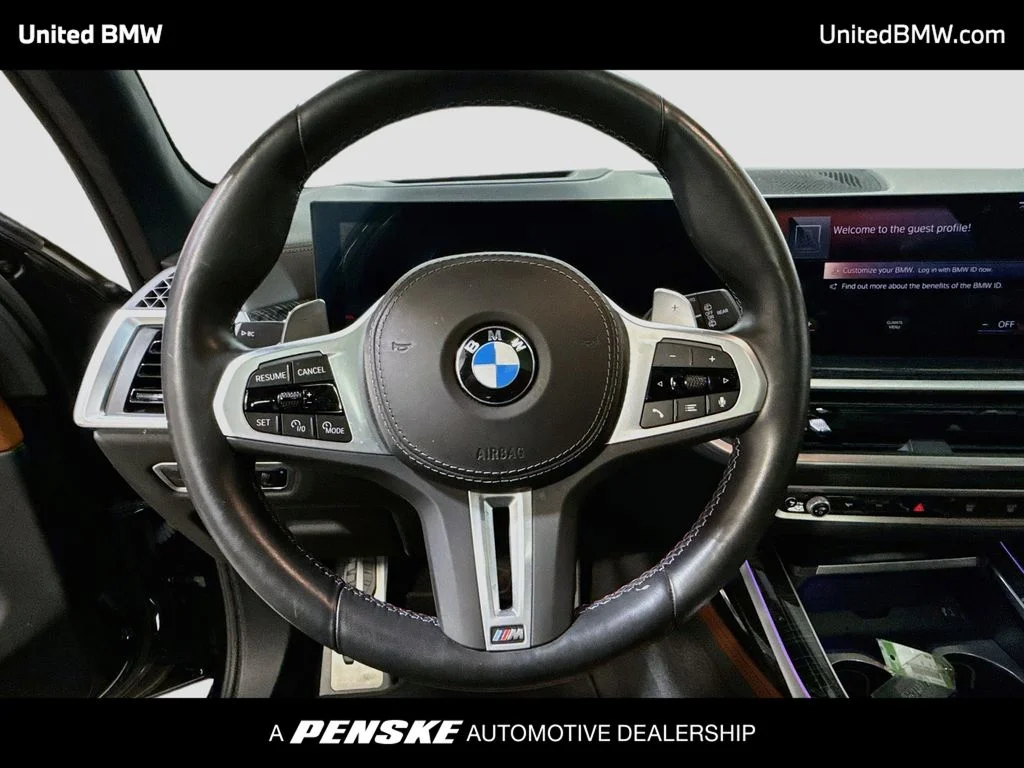 Used 2023 Black Sapphire Metallic BMW M60i image 6