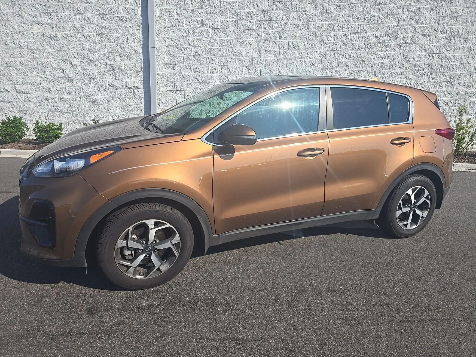 Used 2021 Burnished Copper Kia LX image 1