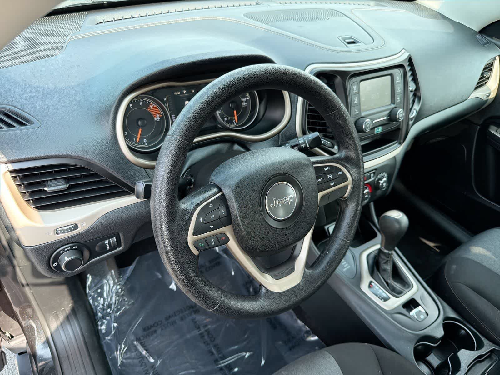Used 2016 Brilliant Black Crystal Pearlcoat Jeep Sport image 10
