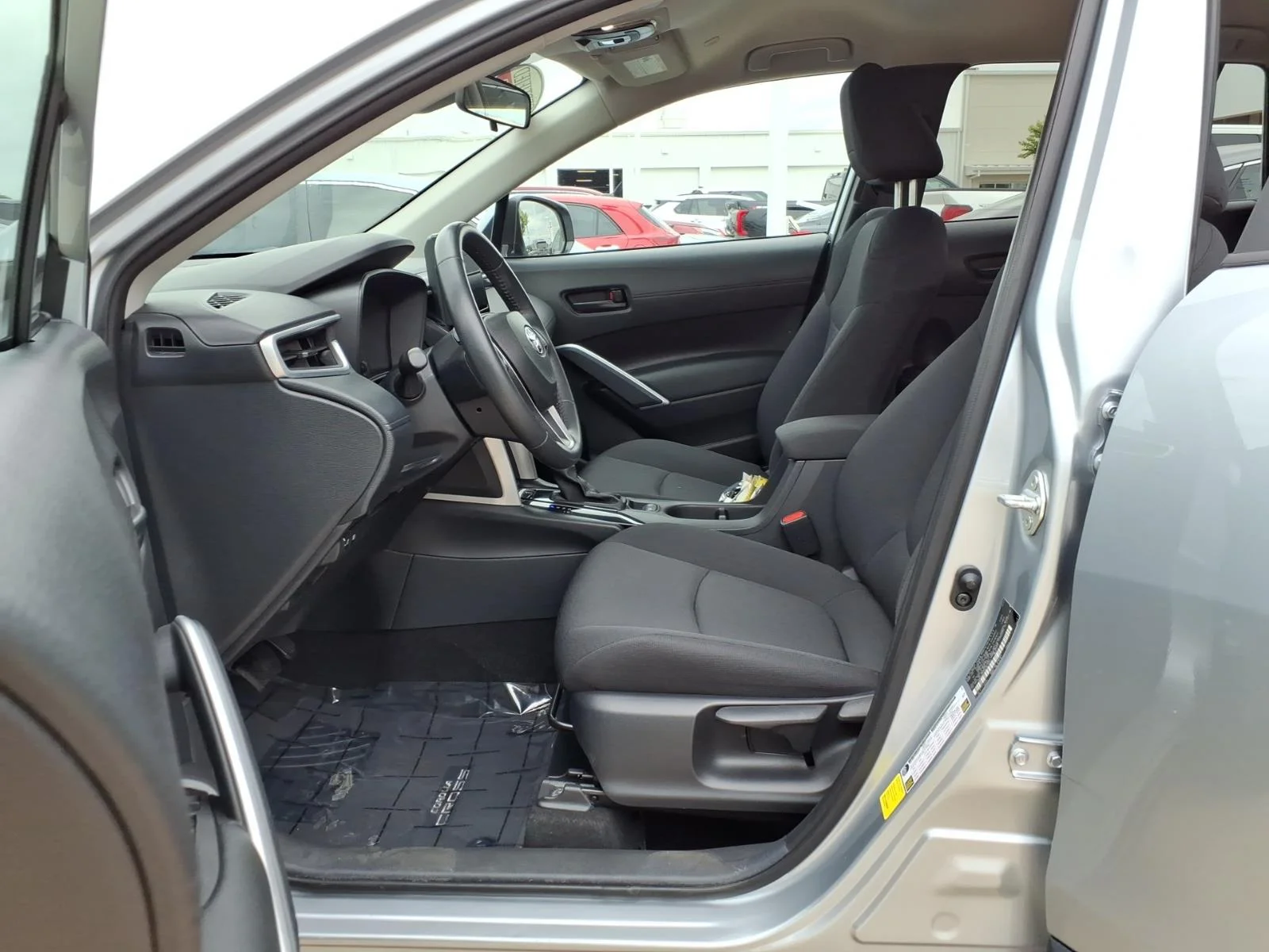 Used 2024 Sonic Silver Toyota LE image 13
