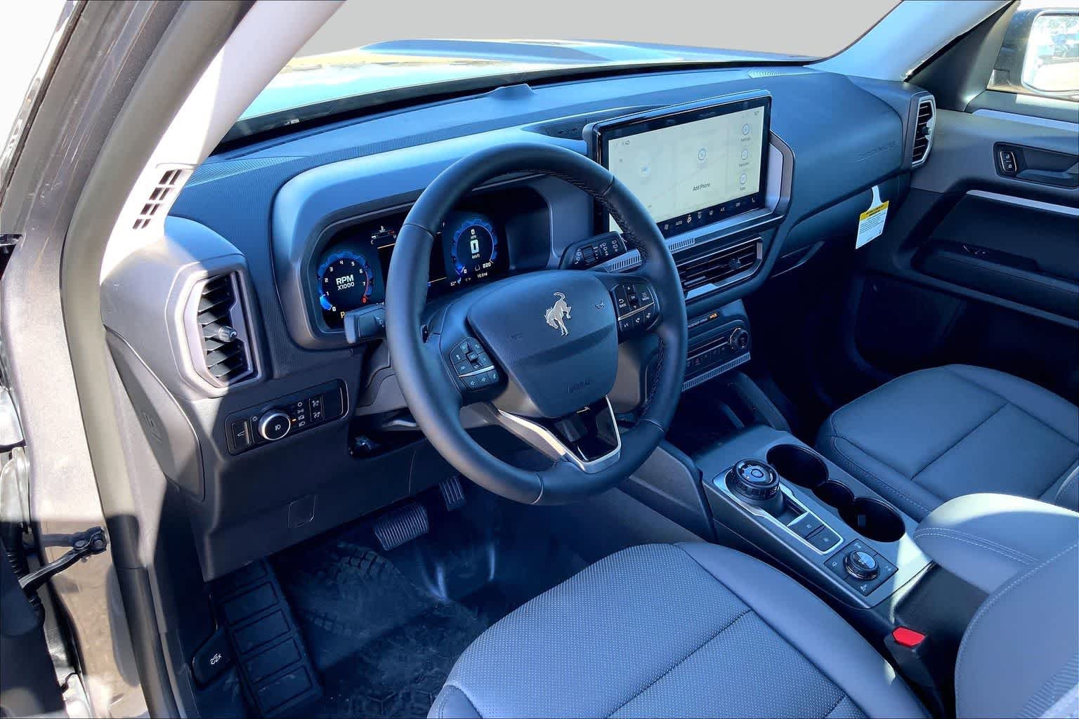 New 2025 Carbonized Gray Metallic Ford Badlands image 8