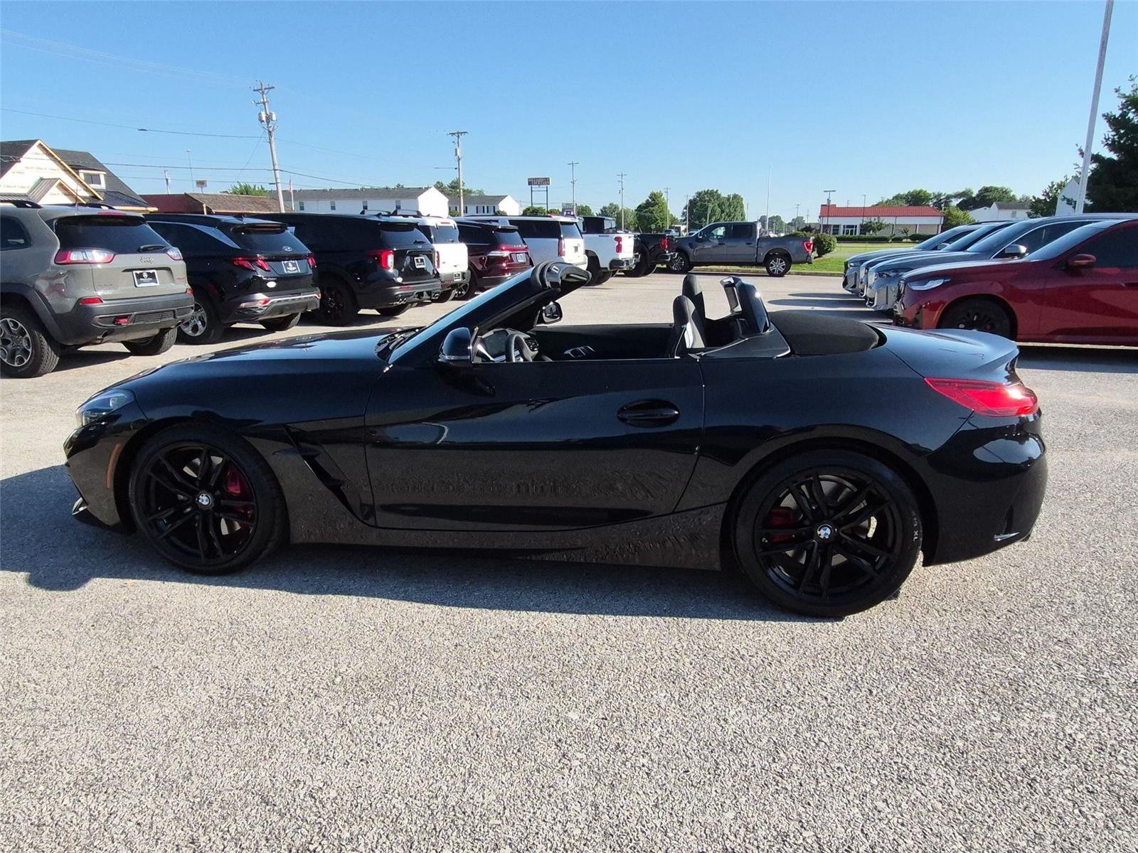 Used 2025 Black Sapphire Metallic BMW M40i image 2